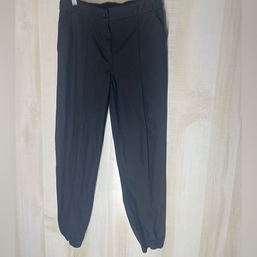 Lululemon Warpstreme high rise 7/8 jogger black button front pockets, size 28